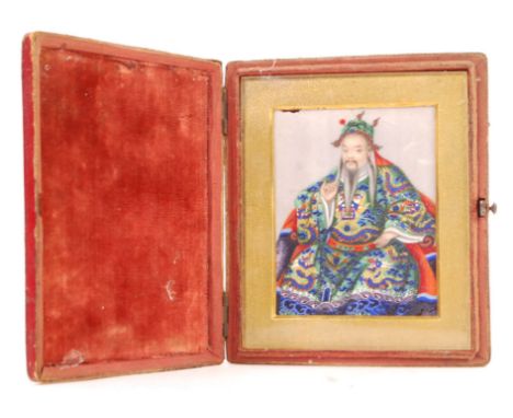 A rare 19th Century Chinese watercolour painting on rice paper portrait miniature depicting a Chinese gentleman in green silk