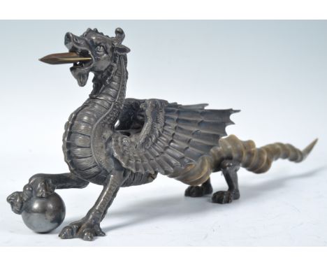 Walker &amp; Hall - Ye Dragon Of Wantley A rare 19th / early 20th Century table lighter in the form of a dragon having silver