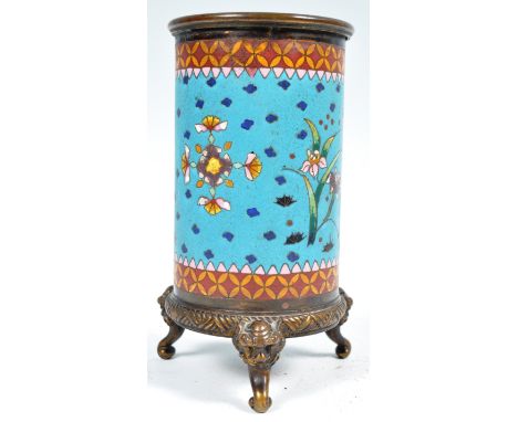 An antique Qing Dynasty Chinese Cloisonne brush pot of usual cylindrical form having inlaid and brightly coloured enamel flow