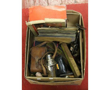 A box of miscellaneous to include 78 rpm records, tools, cameras, silver plate, Escalado game, etc.