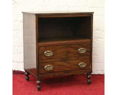 An antique mahogany single drawer bedside cabinet raised on turned supports, converted for commode chest.