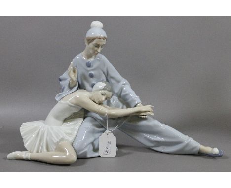 A large Lladro figure group formed as a pair of ballet dancers.