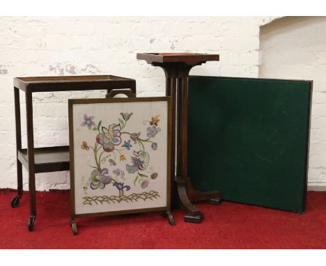 Four pieces of furniture: a two tier tea trolley, a tapestry set firescreen, a folding card table and a mahogany plantstand.