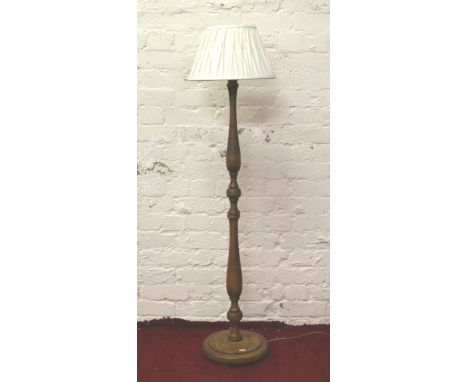 A turned ash standard lamp.