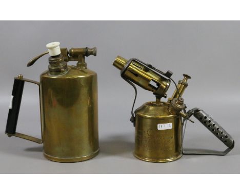 A Swedish Max Sievept brass blow lamp along with a brass cased oil dispenser.
