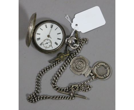 A Victorian silver cased hunter pocket watch with enamel face and subsidiary dial assayed London 1879 along with silver Alber