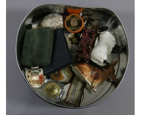 A tin of collectables to include German ceramic model of a Corgi, Beswick model of a ram (af), golfing medallions, oriental m