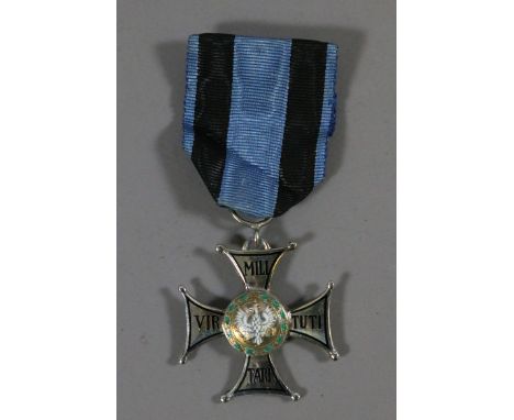 A Polish silver and enamel Virtuti Militari 5th Class breast badge.