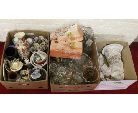 Three boxes of miscellaneous ceramics and glass to include fruit bowls, boxed fruit sets, ornaments, table centrepieces, vase