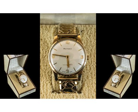 Gent's 9ct Gold Rotary Wrist Watch with Arabic and baton numerals, manual wind, on an expanding bracelet, in working order.