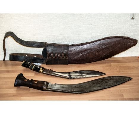 Two Antique Gurkha Knives, one with leather scabbard. 