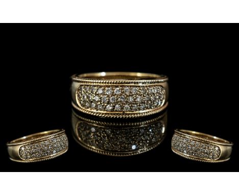 Ladies 9ct Gold Attractive Diamond Set Gold Band Ring. Marked 9ct to Interior of Shank. All Diamonds of Good Colour and Clari