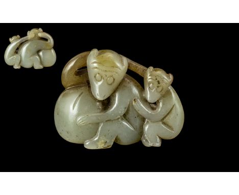 Chinese - Late 19th Century Well Carved Jade Figure. Depicting a Mother and Baby Monkey Holding a Large Fruit. 1.7/8 Inches -