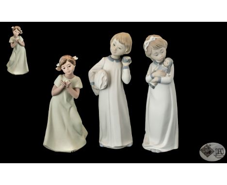 Nao by Lladro Trio of Hand Painted Figures ( 3 ) Comprises 1/ Girl In Nightdress Holding a Doll. Height 10 Inches - 25 cms. 2