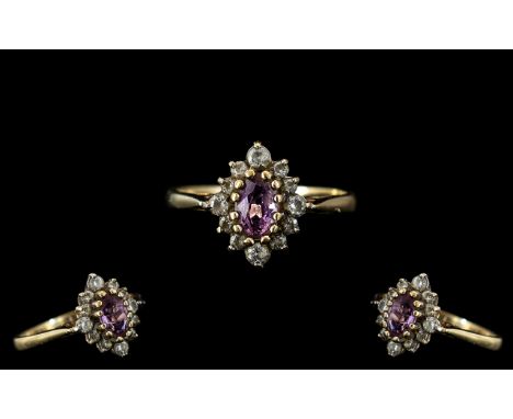 Ladies - Attractive 9ct Gold Amethyst and Diamond Set Dress Ring. Fully Hallmarked for 9.375. The Amethyst Surrounded by 11 D