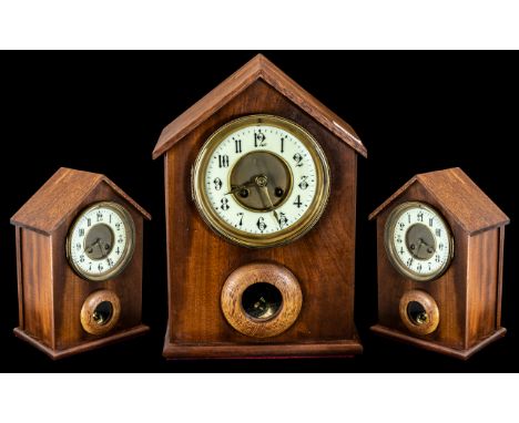A French Movement Mantle Clock with cream chapter dial, Jacques Freres movement, with later wooden case.  In good working ord