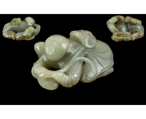 Chinese Late 19th / Early 20th Century Well Carved Jade Figure. Depicts a Male Figure Kneeling Alongside a Mythical Beast and