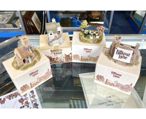Four Boxed Lilliput Lane Cottages, comprising 'Wedding Bells', 'Gulliver's Gate', 'The Sidings' and 'Fisherman's Cottage'.  A