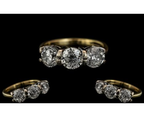 18ct Gold - Superb 3 Stone Diamond Ring. Full Hallmark for 18ct to Interior of Shank. The 3 Round Brilliant Cut Diamonds of E