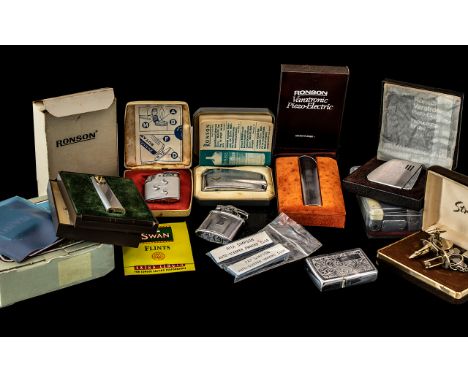 A Collection of Lighters to include two Ronson Varatronic, a Ronson Gas, a Ronson Variflame, a Ronson Pipemaster, all in boxe