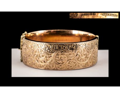 9ct Rose Gold Hinged Bangle, The Front With Chased Floral Decoration, Fully Hallmarked For Birmingham N 1937, Wax Filled. 22m