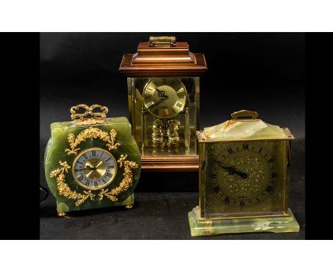 Three Mantle Clocks, comprising an Acctim wooden quartz clock with a gilt face and Roman numerals, measures 10" high, with an