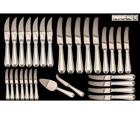 Collection of Elizabeth ll Silver Handled Flatware, all matching, to include cake slice, steak knives, dinner knives etc.; lo