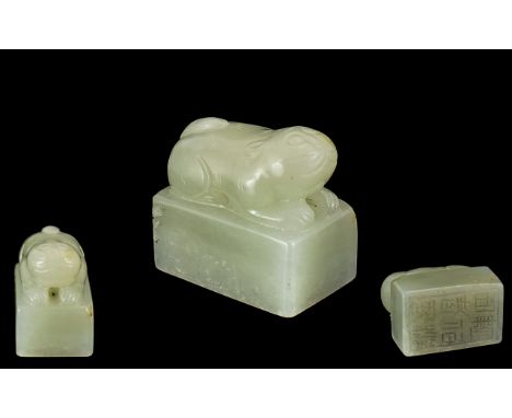 Chinese - Late 19th Century Early 20th Century Well Carved Jade Seal. Depicting a Temple Dog Raised on a Large Stone Slab Wit