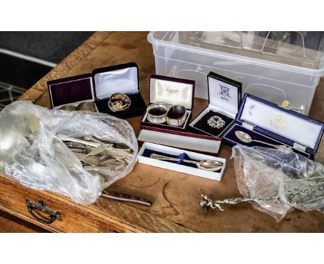 Miscellaneous Lot to include brooches, four silver napkin rings, two Jubilee spoons, a decorative slice, and a collection of 