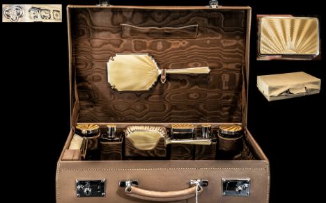 Eight Silver &amp; Enamel Dressing Items, hallmarked Birmingham 1913, by Goldsmiths &amp; Adie Bros.  Champagne enamel, seven