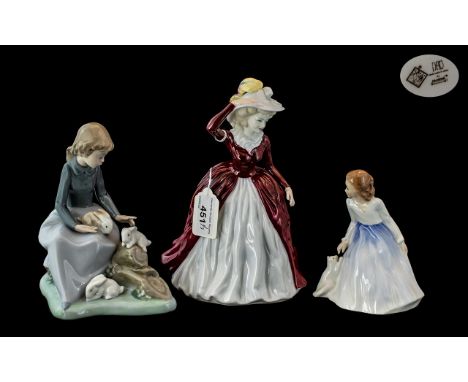 Three Porcelain Figures, comprising a Coalport Ladies of Fashion 'Margaret', Nao figure of a girl with three rabbits, and Roy