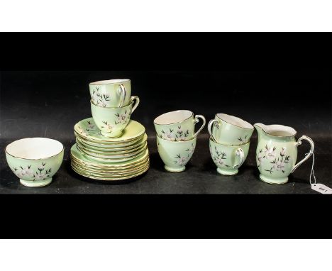 Royal Grafton Tea Set, comprising  six cups, six saucers, six side plates, a milk jug and sugar bowl, all decorated in pale g