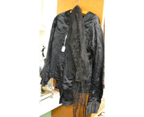 A late 19th century black silk mourning two piece, with lace scarf