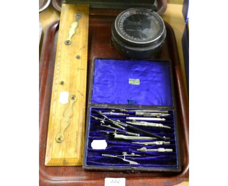 A type P6 military compass, a part set of drawing instruments (cased) and a Captain Field improved folding ruler 