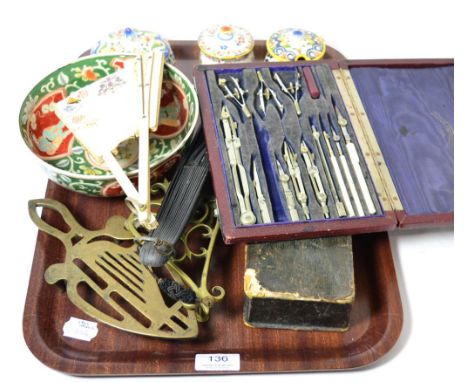 A 19th century fan with various signatures, part drawing instrument set, early 20th century carved ivory needlecase, three en