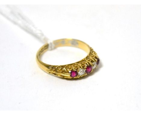 An 18ct gold diamond and ruby ring