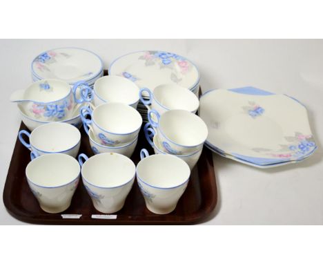 A 1930's Shelly part tea service for twelve place settingsTwo side plates with slight scratching. One cup with very slight st