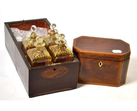 A Georgian inlaid mahogany four bottle decanter box, containing four parcel gilt decanters, together with a regency mahogany 