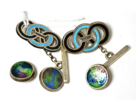 Three silver and enamel dress buttons by Liberty & Co and a pair of silver and enamel cufflinks 