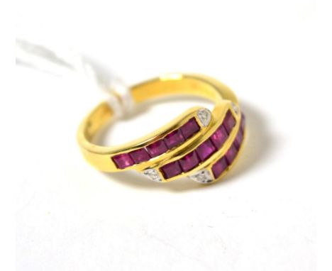 A ruby and diamond three row ring, stamped 750
