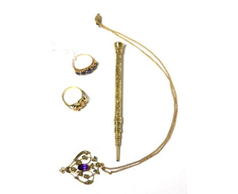 A sapphire ring, a knot pattern ring, an Art Nouveau amethyst and seed pearl pendant on chain and a propelling pencil (4)