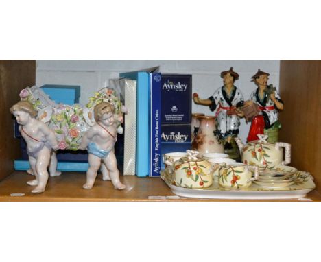 A Victorian porcelain tea service with faux bamboo handles and painted with berries together with a pair of Hadley's Worceste