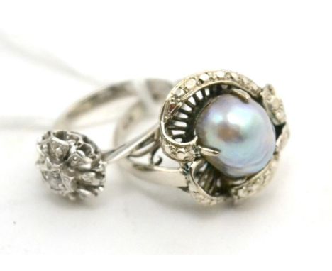 A diamond solitaire ring the band stamped 18K together with a Baroque pearl ring 