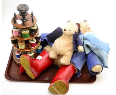 A mahogany four tier bobbin stand together with two Paddington Bear toys