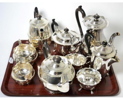 A Walker & Hall silver four piece tea set together with a Walker & Hall five piece silver plate tea service Silver four piece