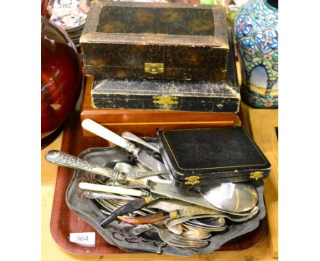 A cased set of six silver coffee spoons with bean finials, two cased sets of fruit knives and forks, a cased silver cruet set