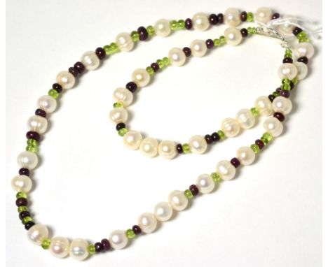 A cultured pearl and ruby and prasiolite bead necklace, round cultured pearls spaced by groups of tumbled ruby and prasiolite