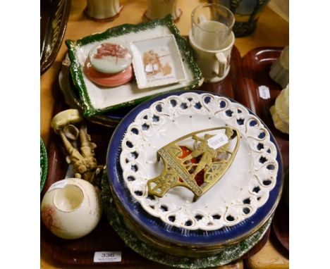 A Gentleman in Kharki after Rudyard Kipling - a Macintyre Moorcroft pottery matchball and paperweight, a small bisque  porcel