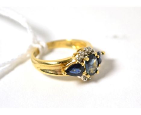 A sapphire and diamond ring, stamped 14K