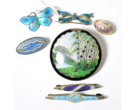 An enamel brooch by Hans Jensen and six other enamel brooches (7)